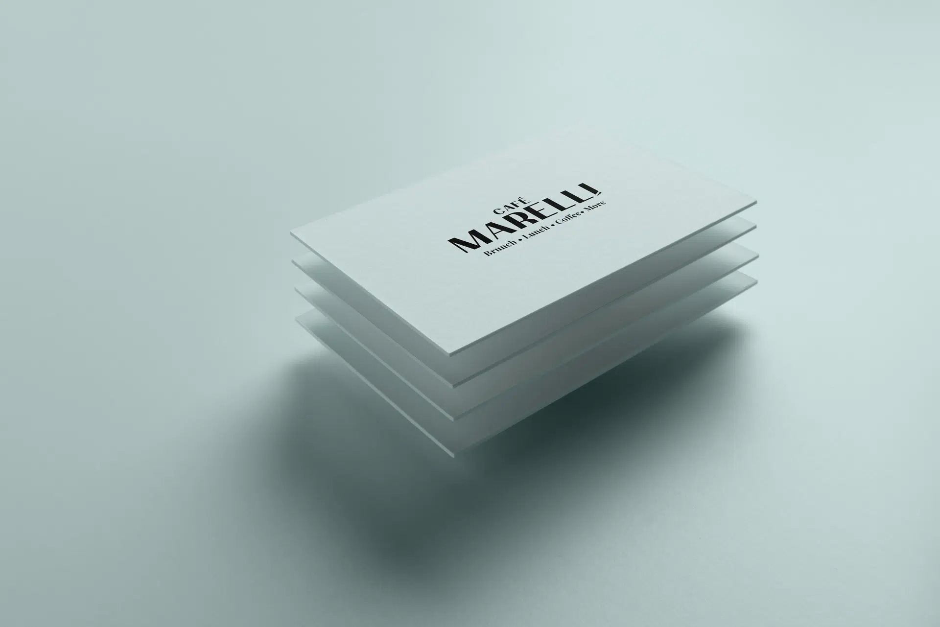 Marelli cafรฉ brand identity featuring warm colors, bold type, and soft industrial details inspired by French bistros and Maltese expression.