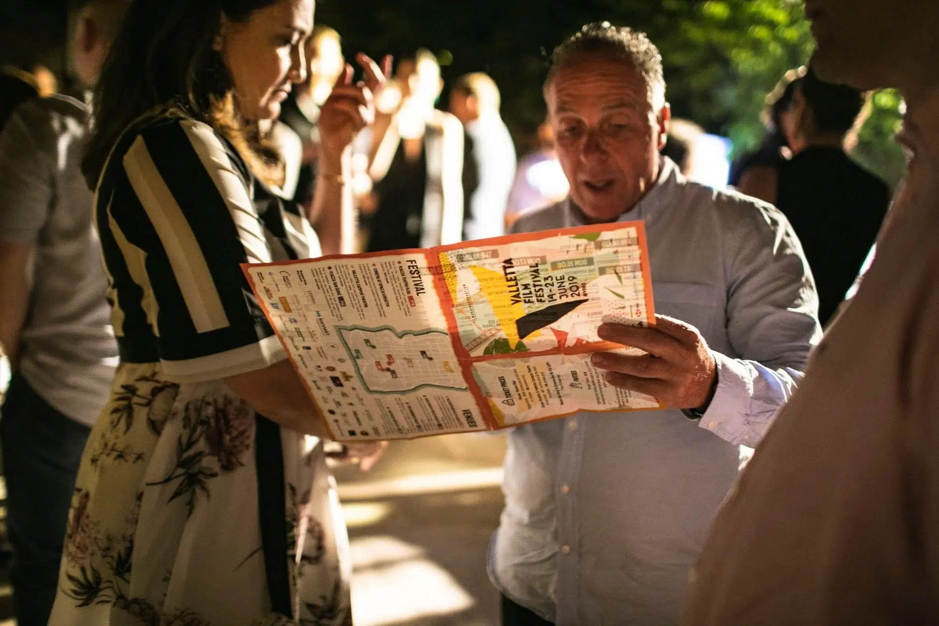 Visual identity series for Valletta Film Festival featuring annual poster designs, merchandise, programs, and motion graphics reflecting the citywide film celebration.